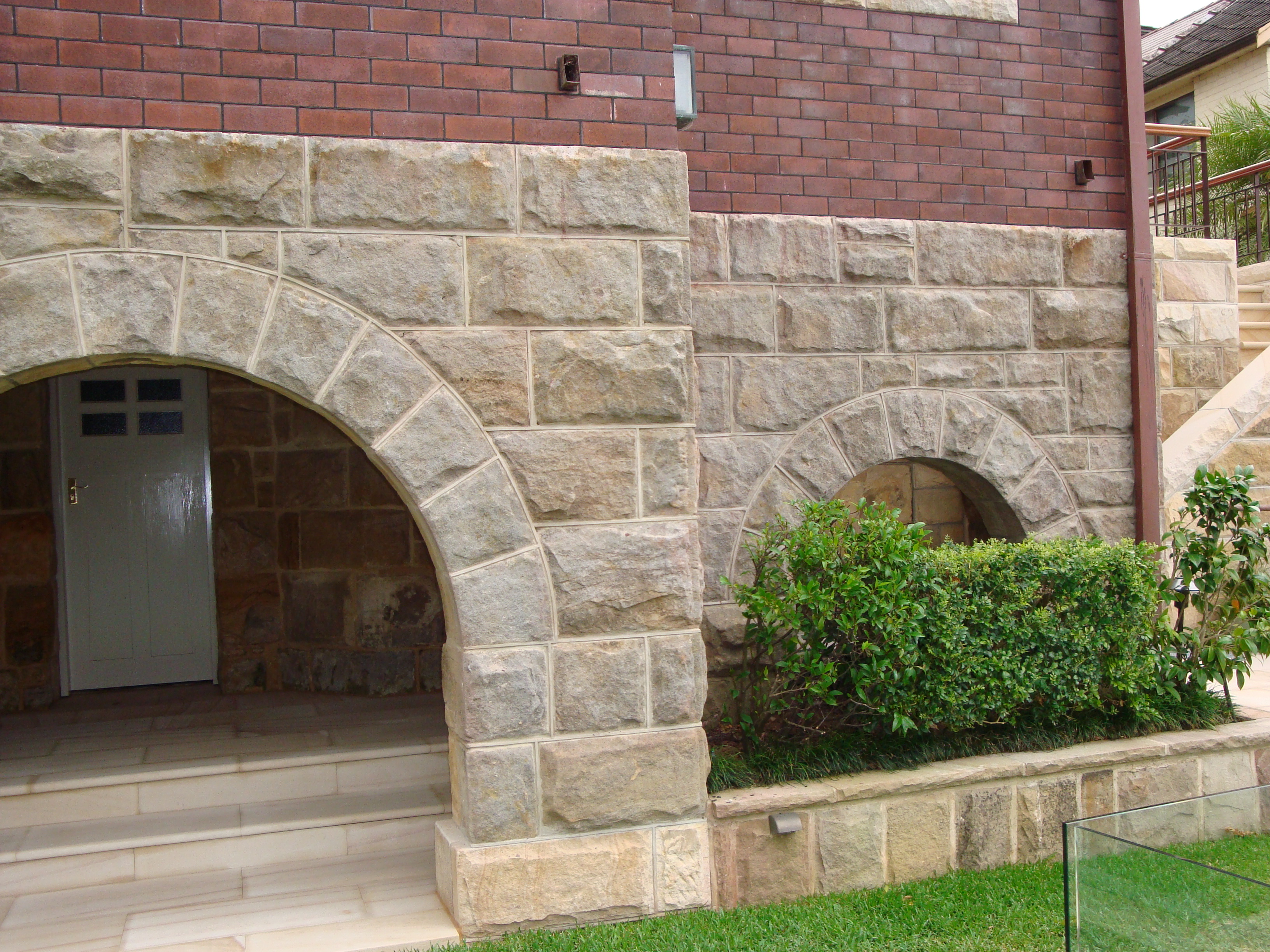 Archways with shrubs