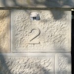 Carefully hand carved numerals or letters; - convey a message to represent the environment. The carved surface may be raised or recessed. This affect creates a uniqueness to the surrounds.