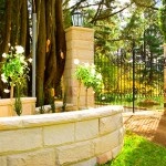 The curved sandstone fencing delivers a feeling of grandeur. Incorporating appropriate landscaping and architectural fixtures enhance the atmosphere you wish to create.