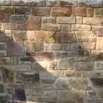 Irregular blocks of sandstone reveal the uniqueness of stone while still achieving consistency with the overall appearance.